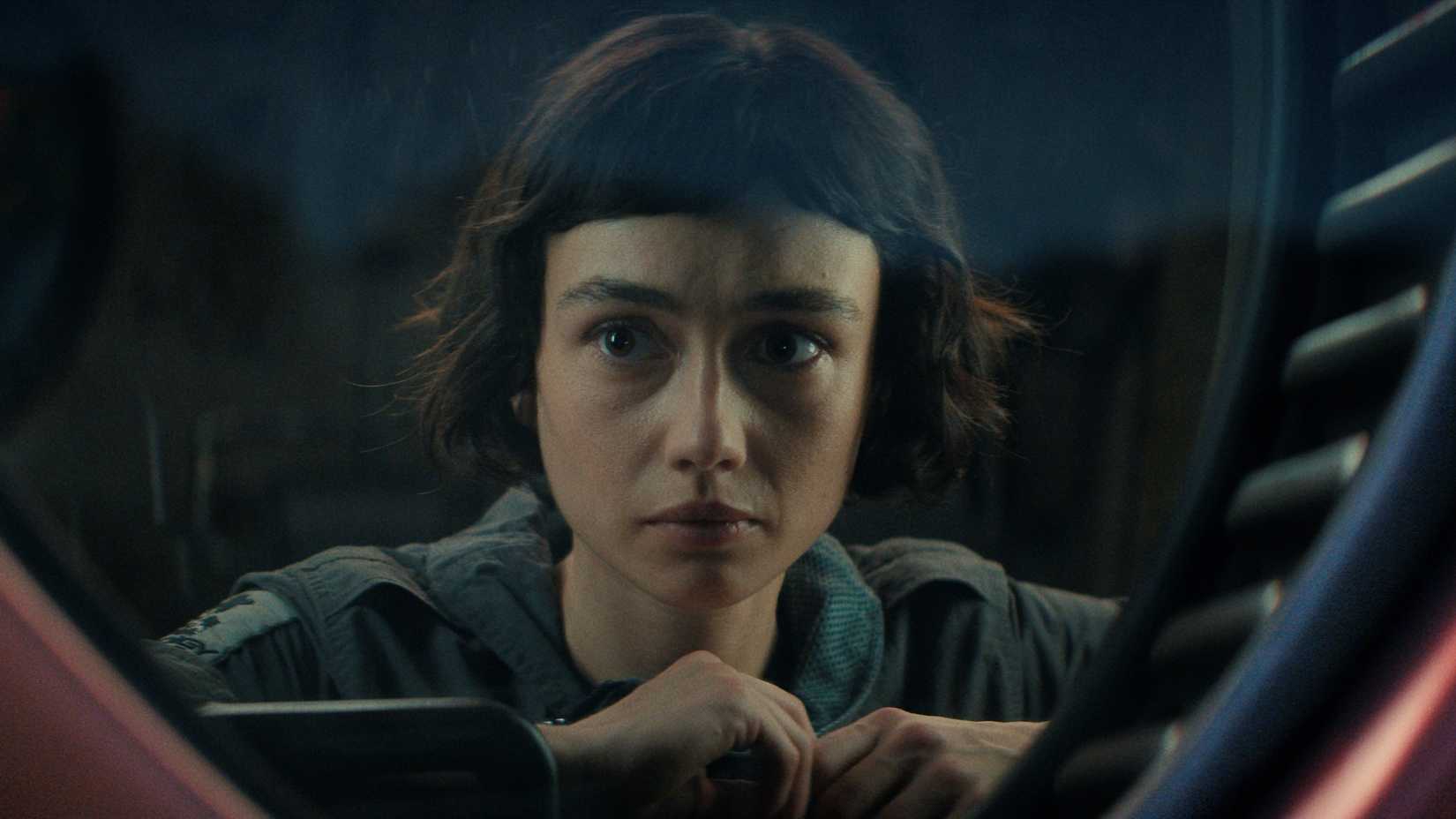 Wendy looking out of a window in Alien: Earth