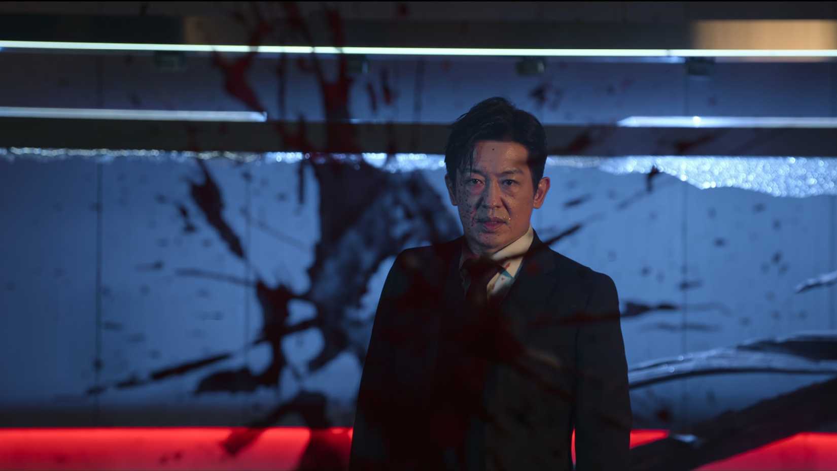 Baek Sang-gil behind a bloody window in Our Sticky Love