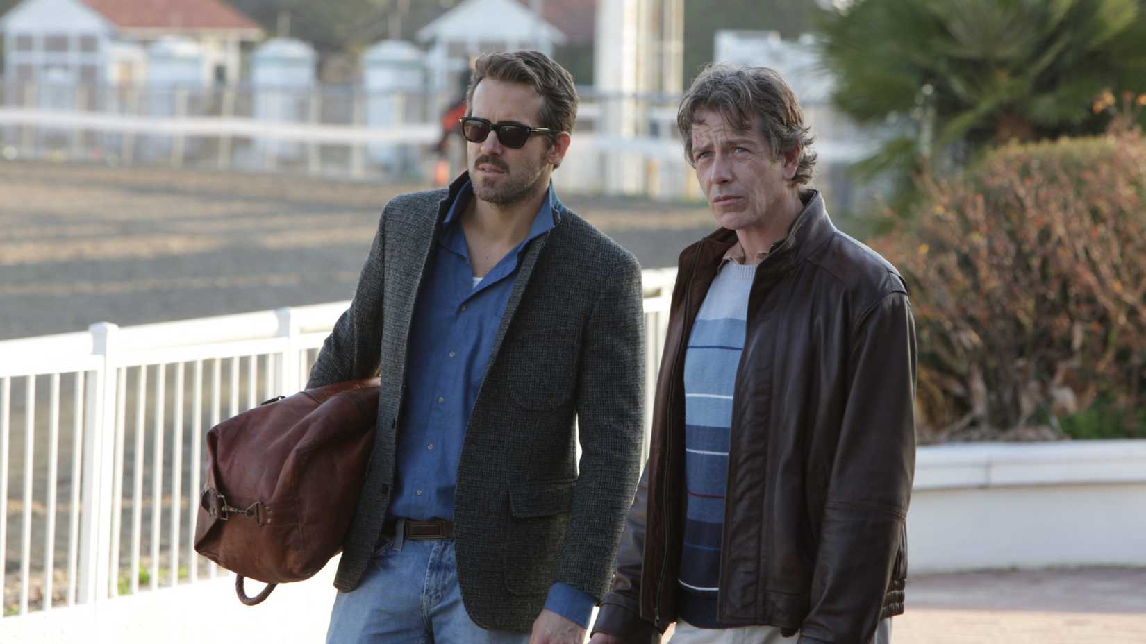 Ben Mendelsohn as Gerry and Ryan Reynolds as Curtis in Mississippi Grind