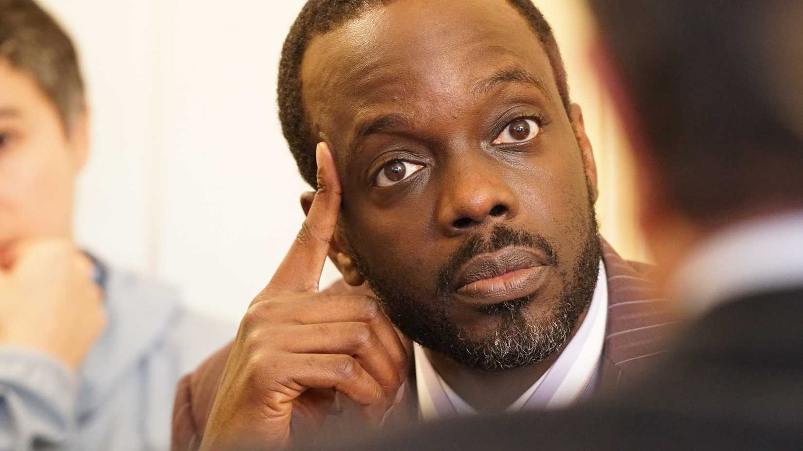 Still of Ato Essandoh as Reverend Darnell Potter in Blue Bloods season 7.