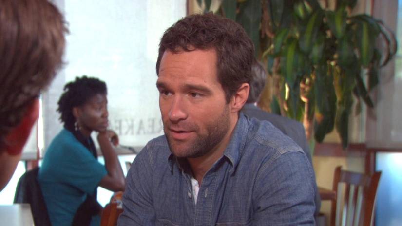 Brian (Chris Diamantopoulos) looking sad in The Office.