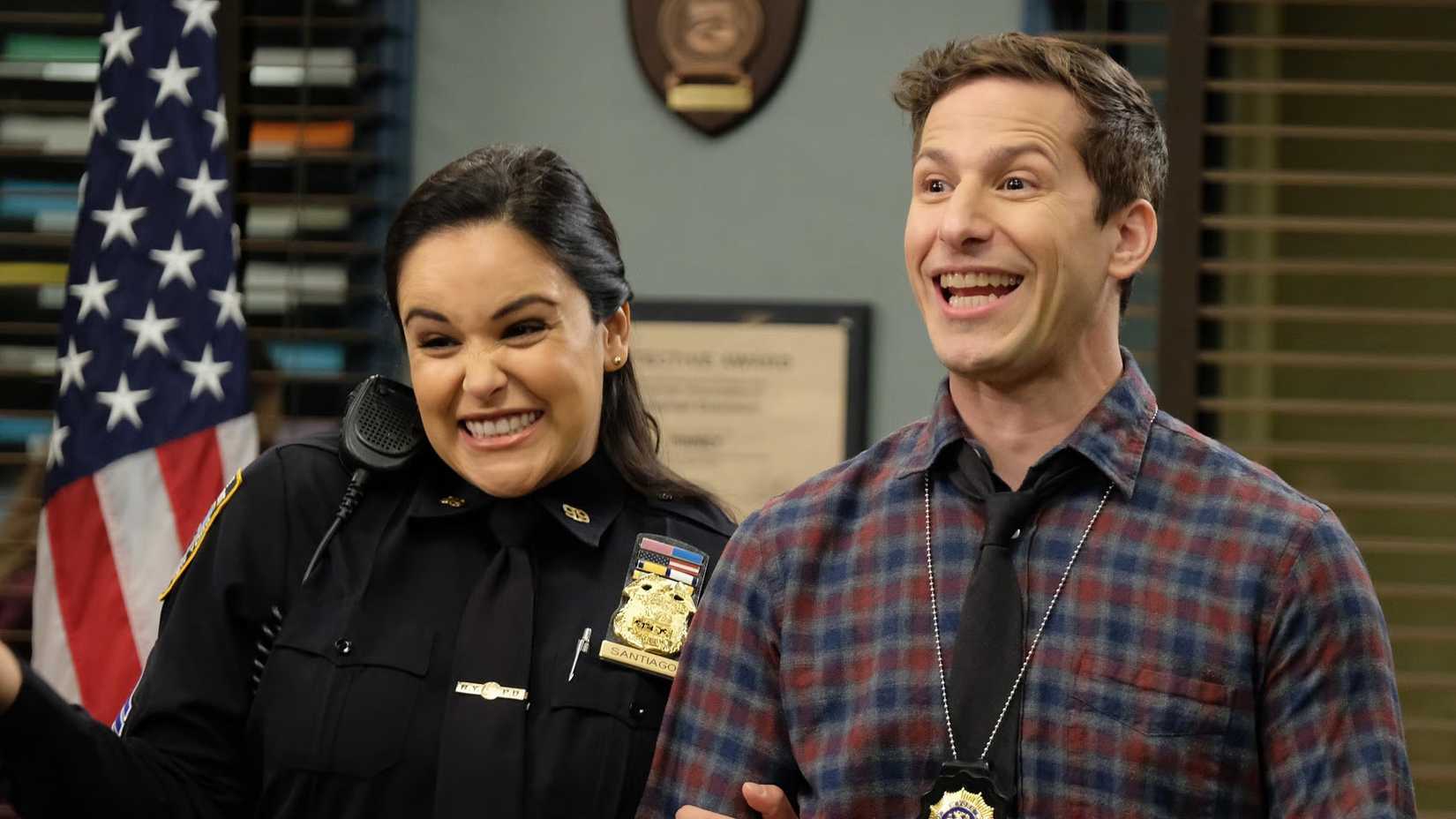 Jake and Amy looking excited in Brooklyn Nine-Nine season 7.