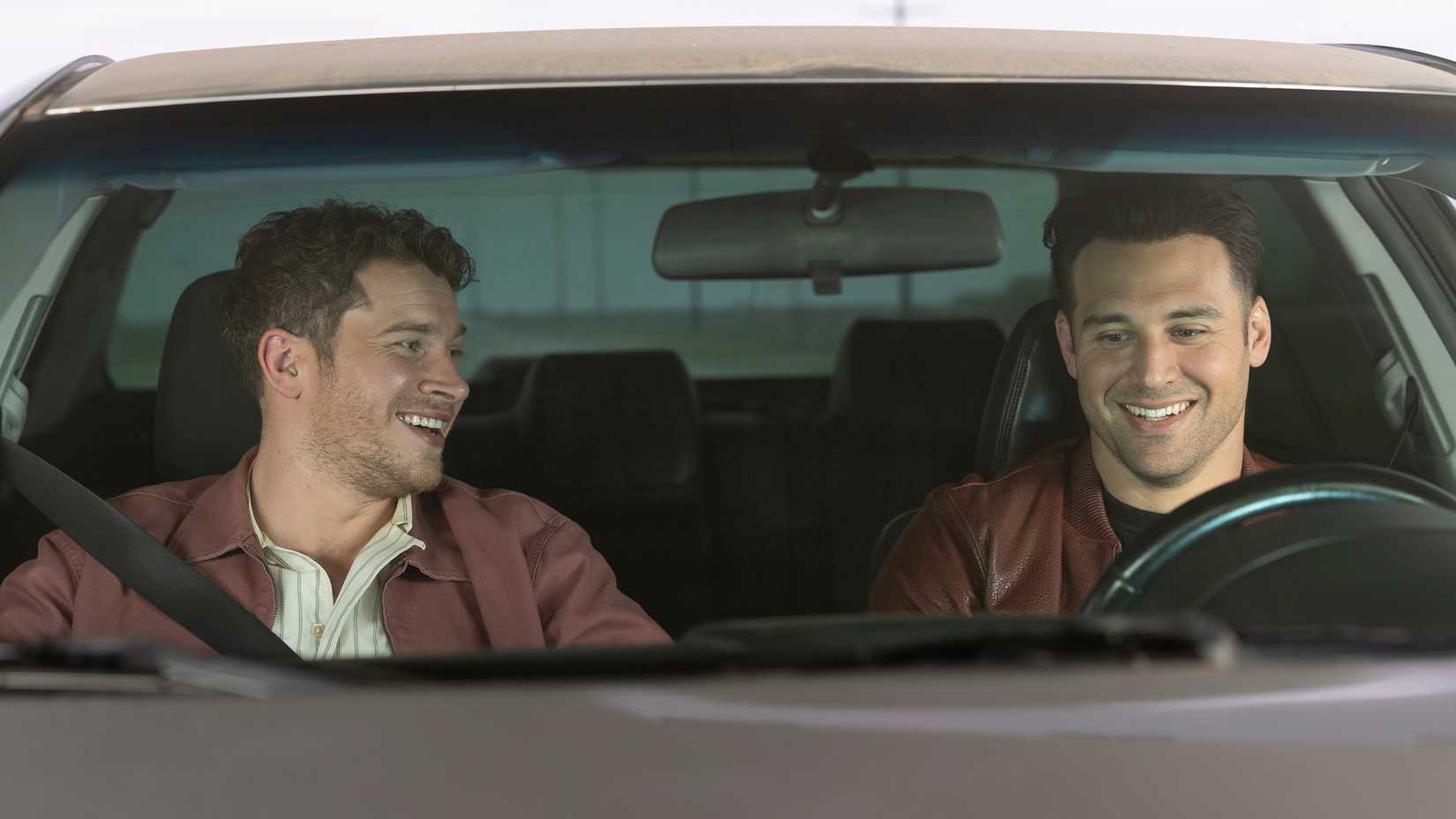 Oliver Stark as Evan "Buck" Buckley and Ryan Guzman as Eddie Diaz on a road trip in 9-1-1 season 9.