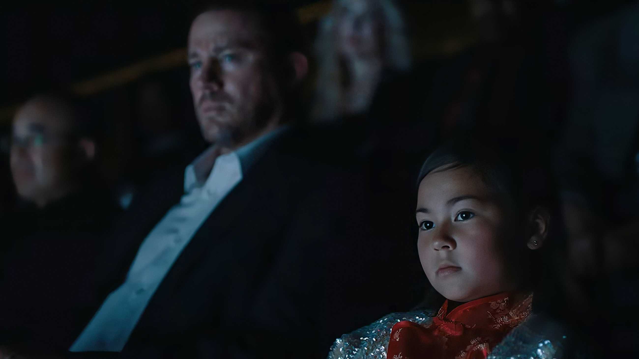 Channing Tatum and Mason Reeves sitting together in the audience of something in Josephine
