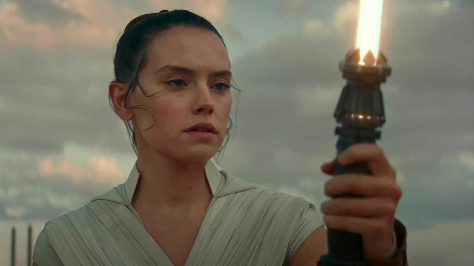 Daisy Ridley as Rey wielding a lightsaber in The Rise of Skywalker