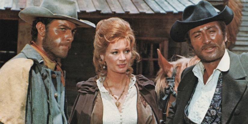 Dana Ghia, Andrea Giordana, and Franco Giornelli standing together in The Dirty Outlaws (1967)