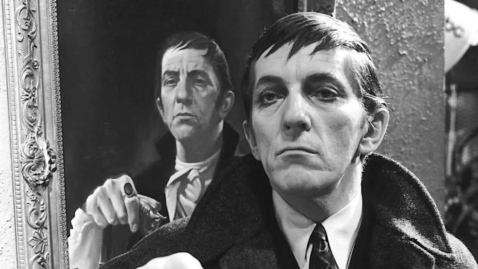 Barnabas Collins standing in front of a portrait of himself in the soap opera Dark Shadows.