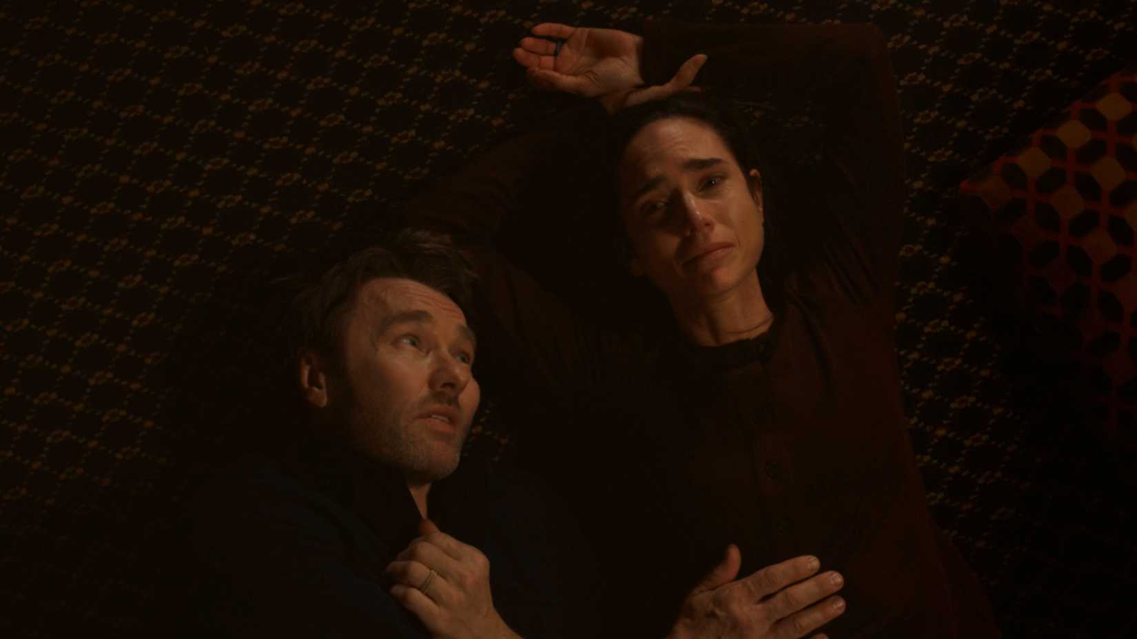 Jason and Daniela lie on the ground while she cries in Dark Matter season 2, episode 4