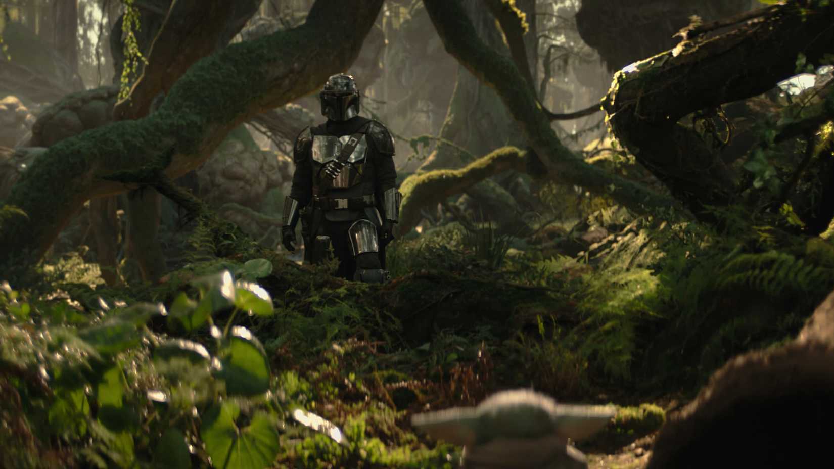 Din Djarin (Pedro Pascal) and Grogu on Nal Hutta in The Mandalorian and Grogu