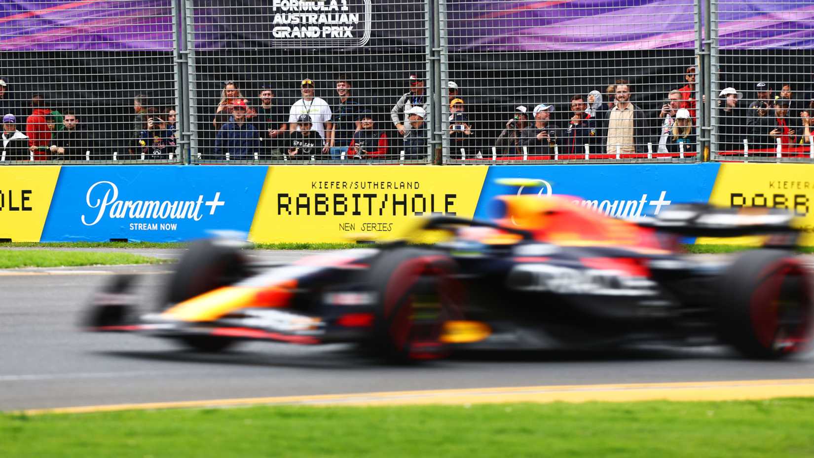 Formula 1 racing with Paramount+ logos