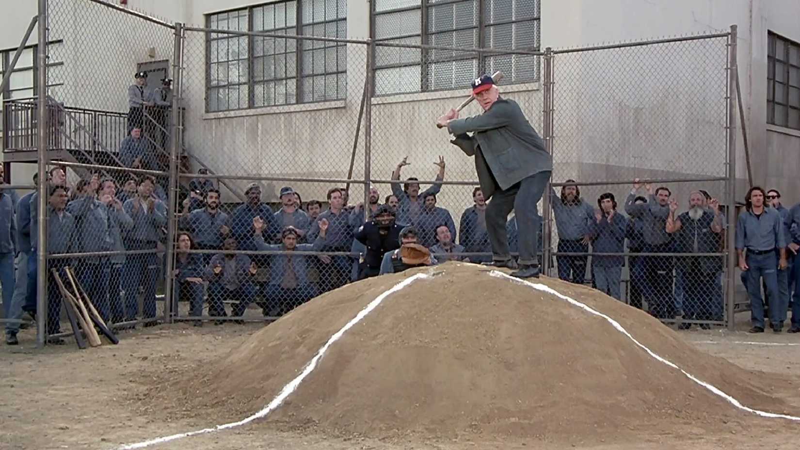 frank playing baseball on a big pile of dirt in Naked Gun 33 1/3