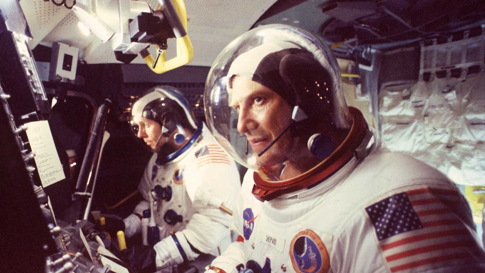 Ted Levine as Alan Shepard piloting a spacecraft next to another astronaut in From Earth to the Moon.