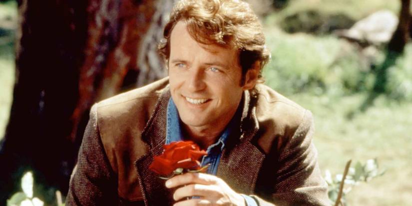 Gary holding a flower in Practical Magic
