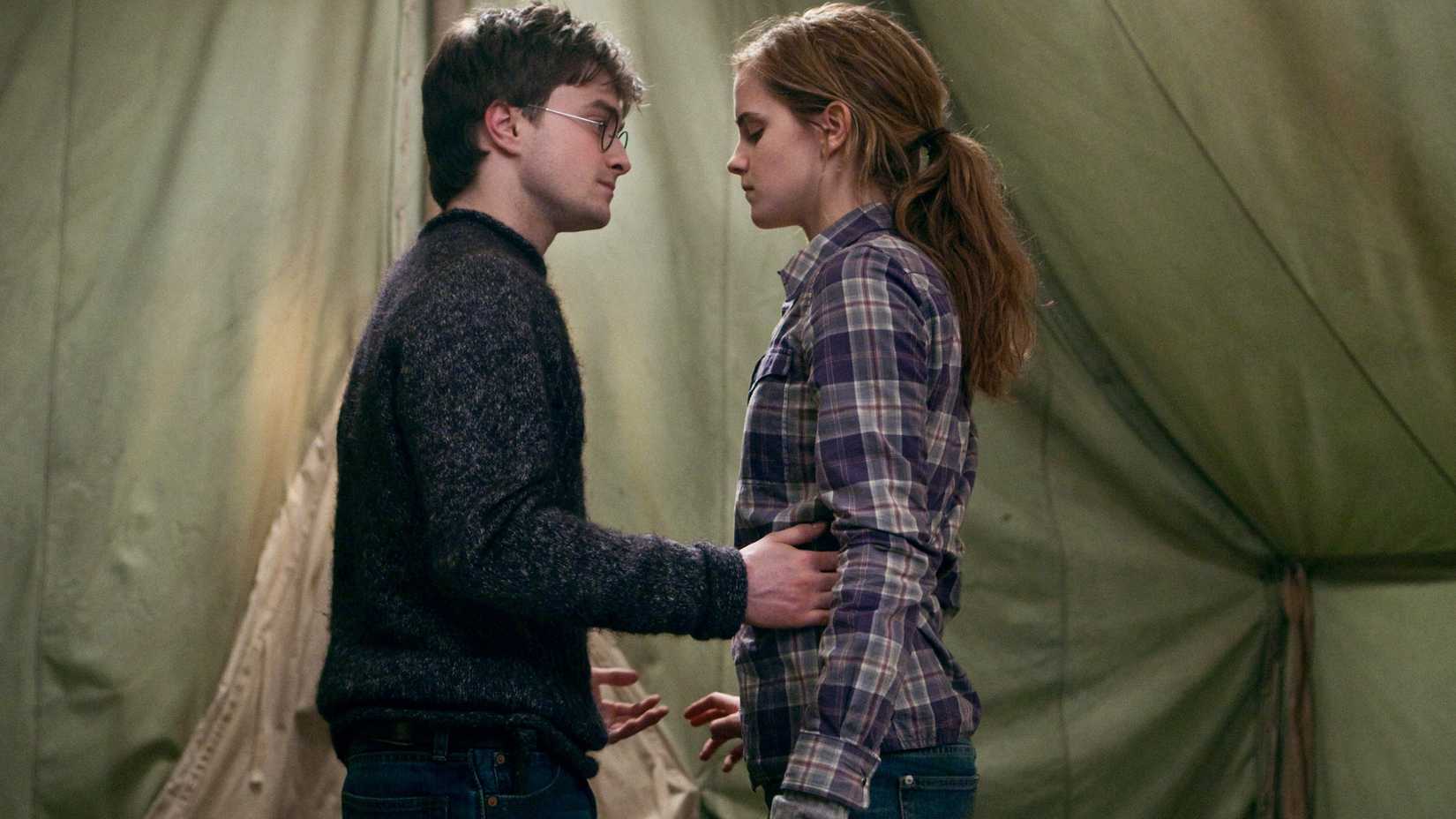 Harry (Daniel Radcliffe) and Hermione (Emma Watson) dancing in Harry Potter and the Deathly Hallows Part 1