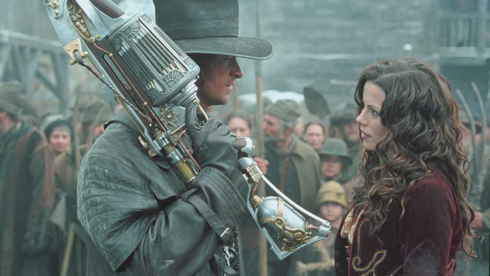 Hugh Jackman's Van Helsing with his crossbow leaning on his shoulder while talking to Kate Beckinsale's Anna in Van Helsing