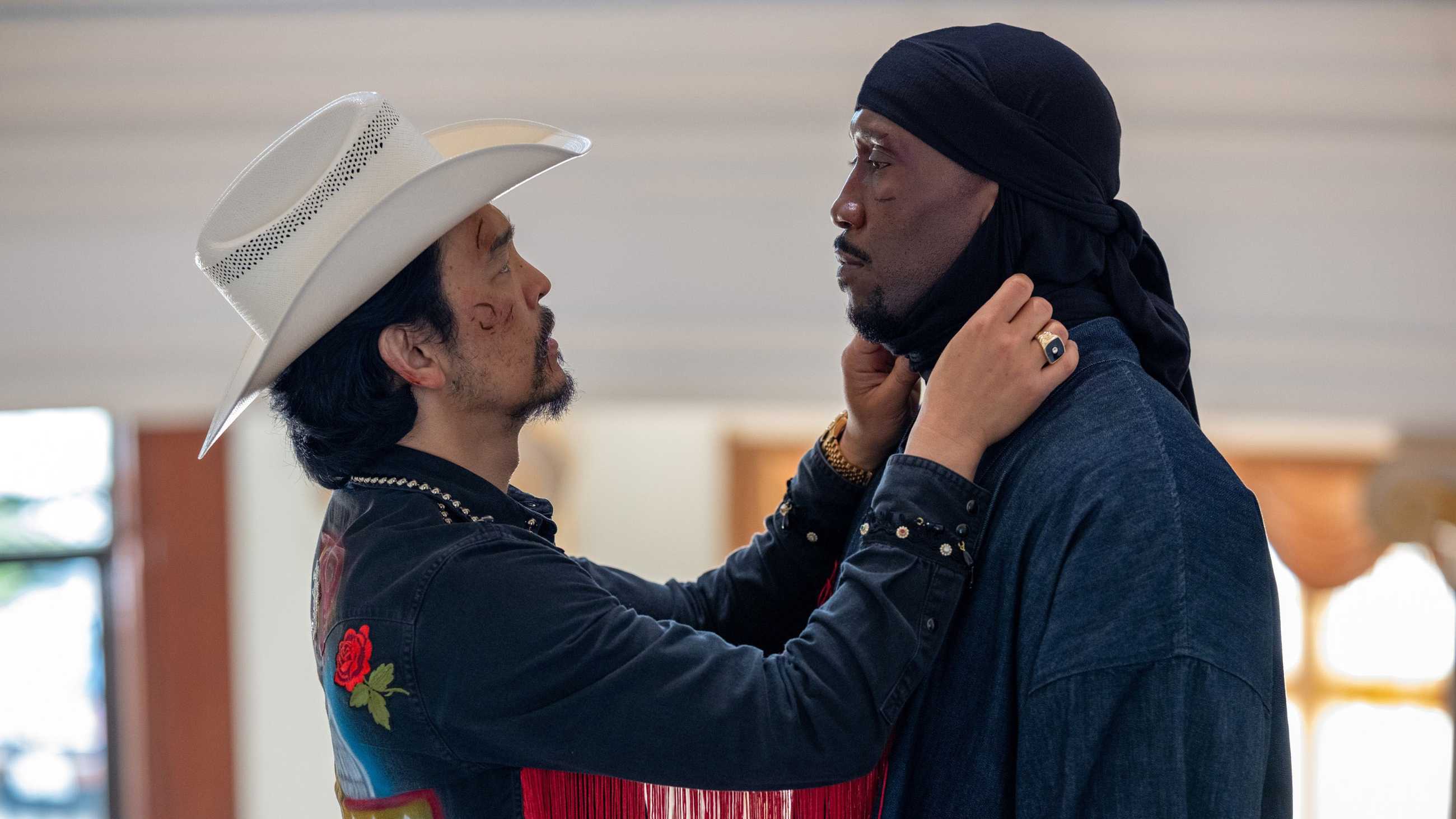 John Cho and Mahershala Ali face each other in Your Mother Your Mother Your Mother