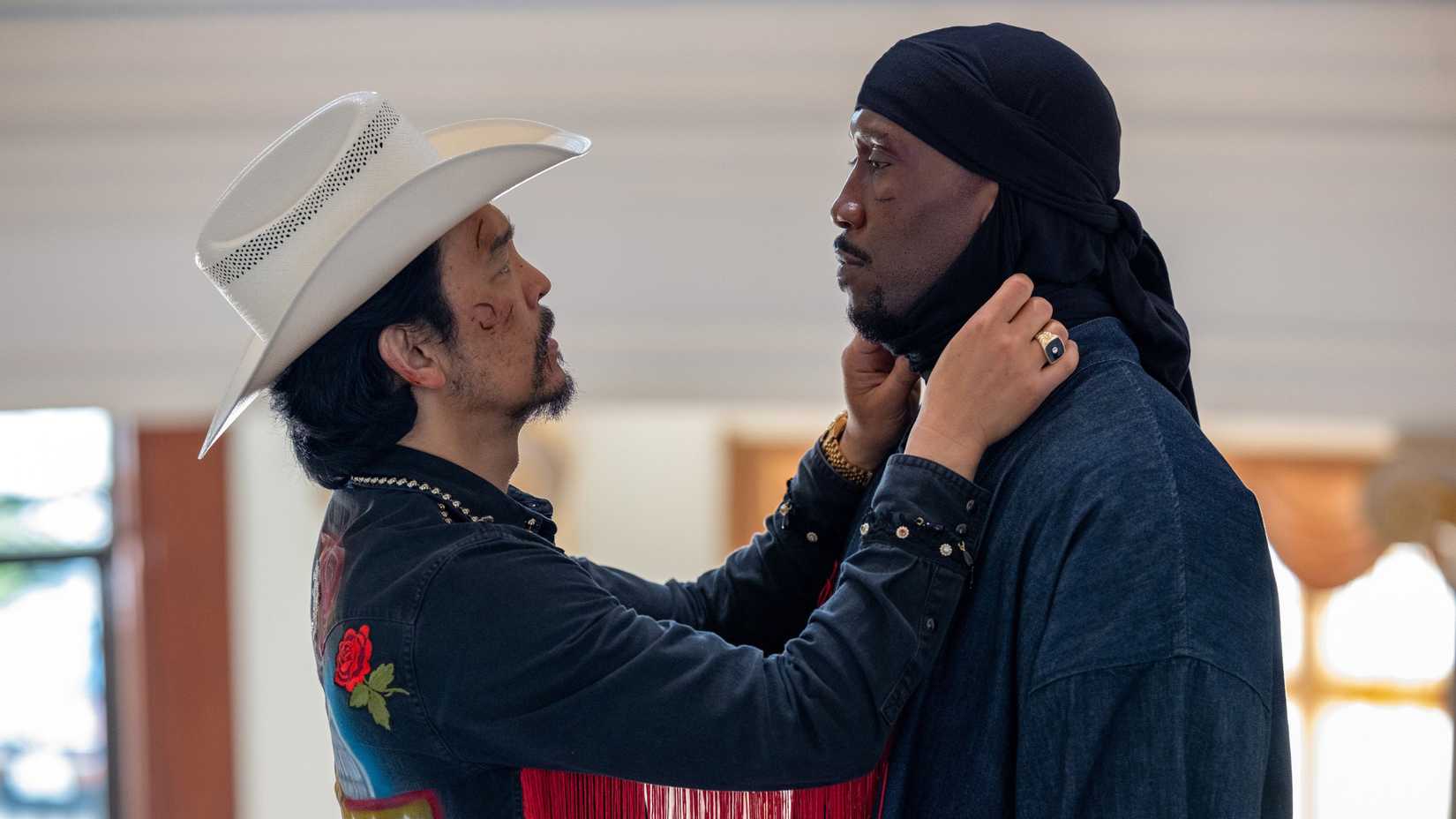 John Cho and Mahershala Ali face each other in Your Mother Your Mother Your Mother
