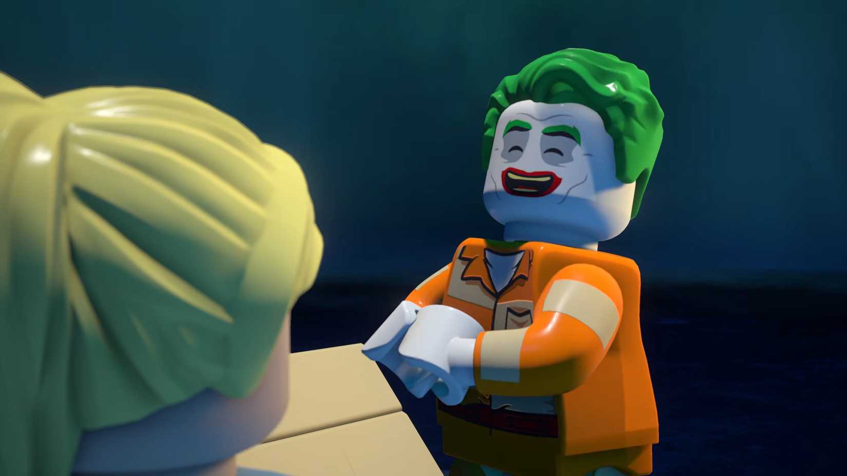 Joker laughing during his "interview" with Dr. Quinzel in Lego Batman Legacy of the Dark Knight.