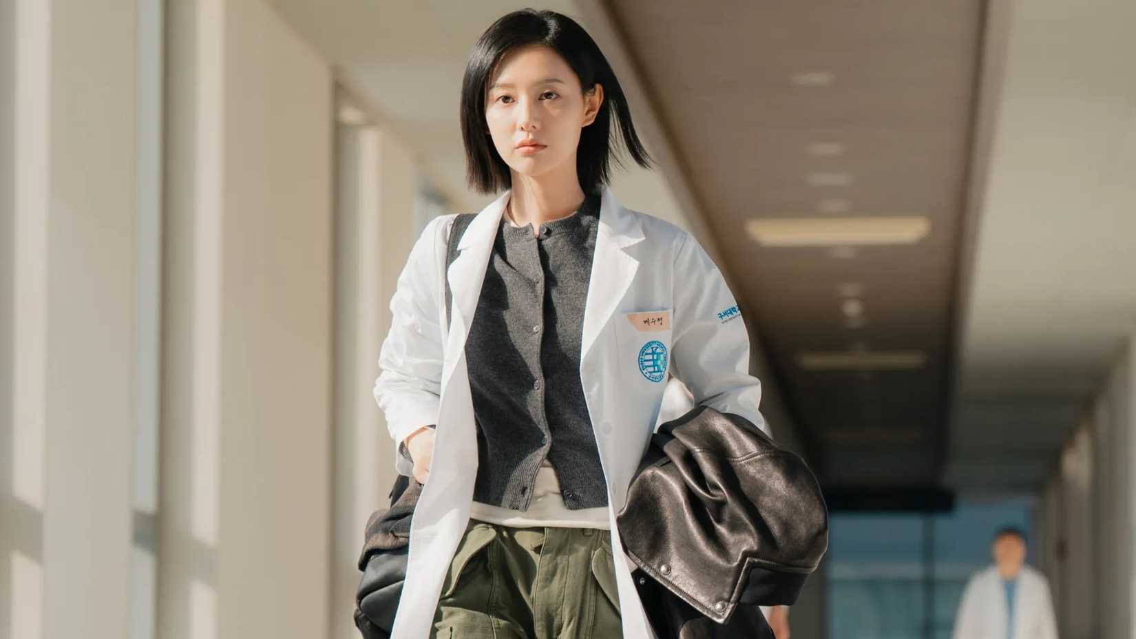 Netflix's Doctor X Mafia in White featuring Gye Su-jeong in her medical attire.