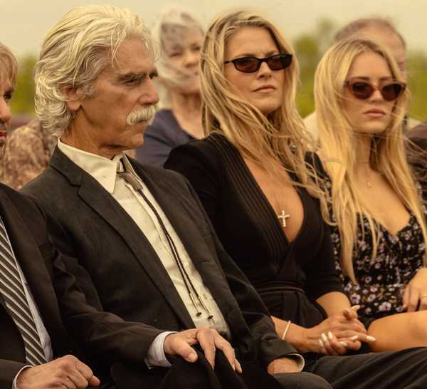 The cast of Landman at a funeral