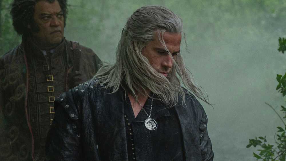 Liam Hemsworth as Geralt with Laurence Fishburne as Regis behind him in The Witcher season 4