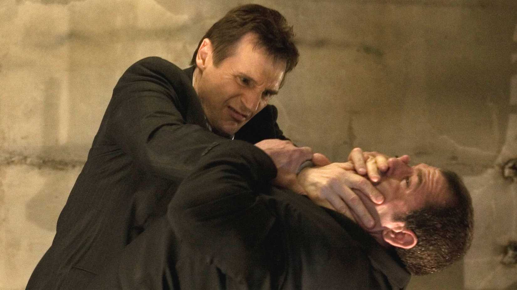 Liam Neeson's Brian Mills chokes a villain in Taken 2008