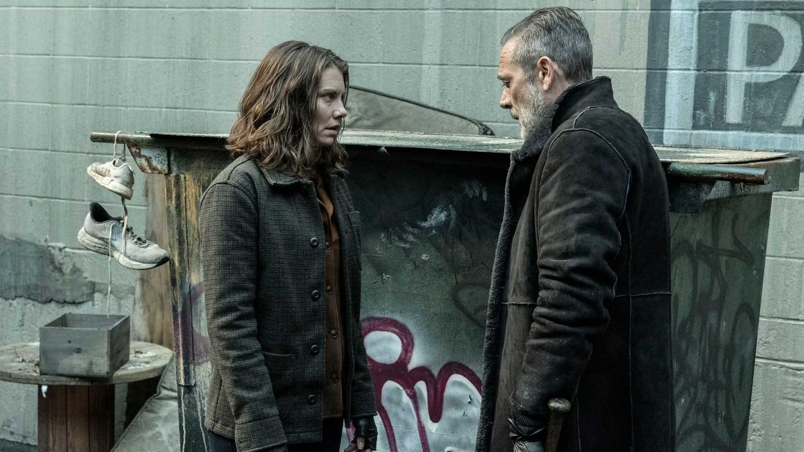 Maggie (Lauren Cohan) and Negan (Jeffrey Dean Morgan) talking in an alleyway in The Walking Dead: Dead City season 3