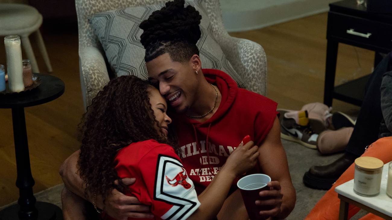 Maleah Joi Moon as Deborah and Cornell Young IV as Shaquille hugging and laughing in A Different World
