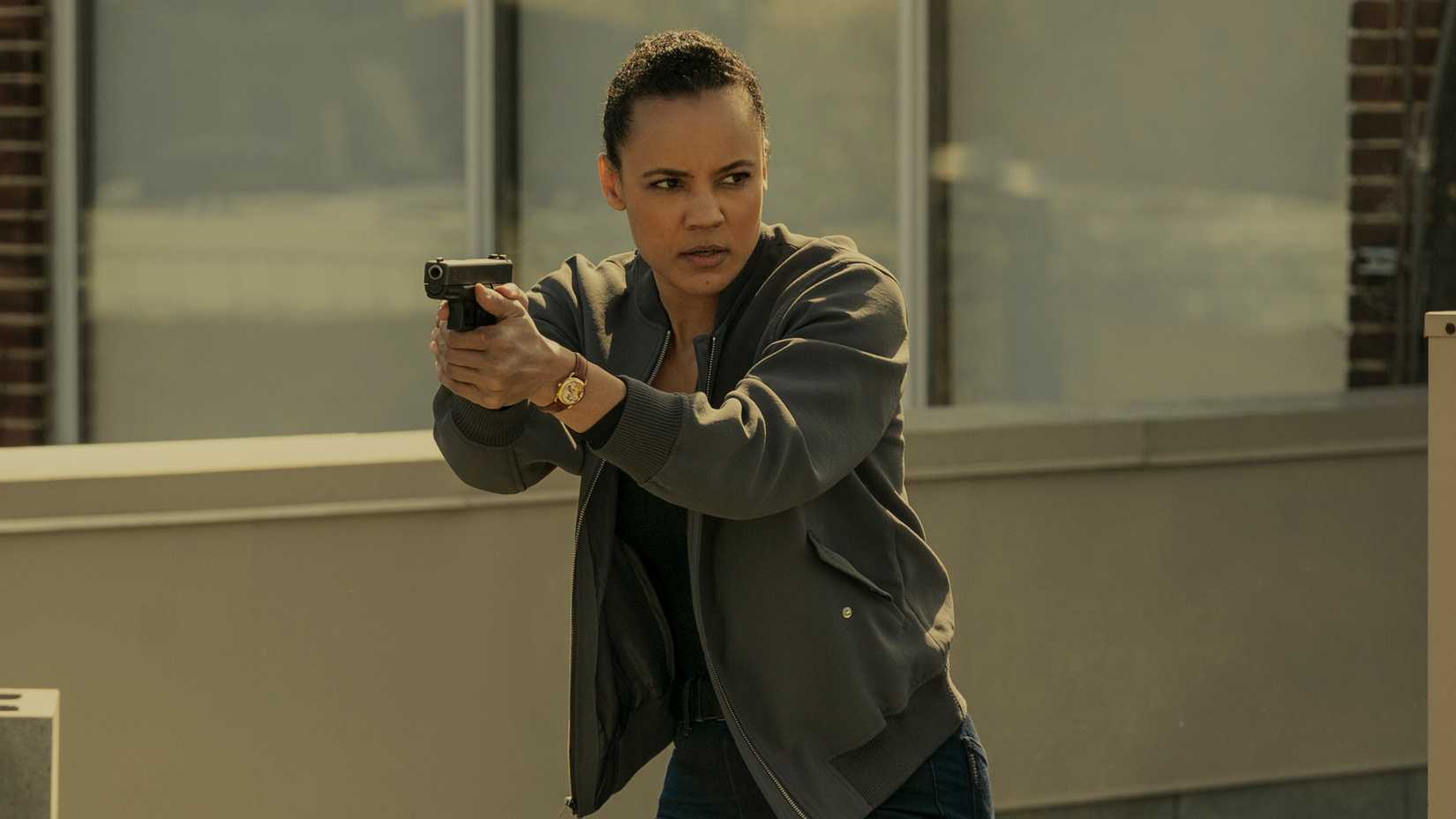 Maria Sten holding a gun as Frances Neagley in Neagley season 1