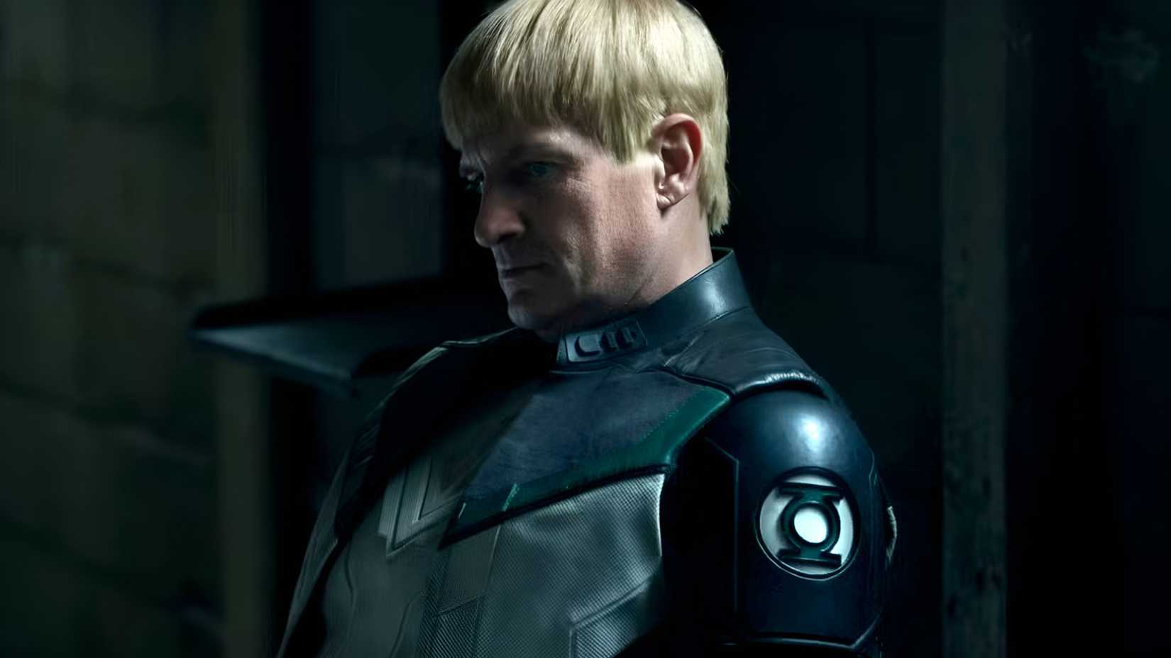 Nathan Fillion's Guy Gardner sits in the dark in Lanterns
