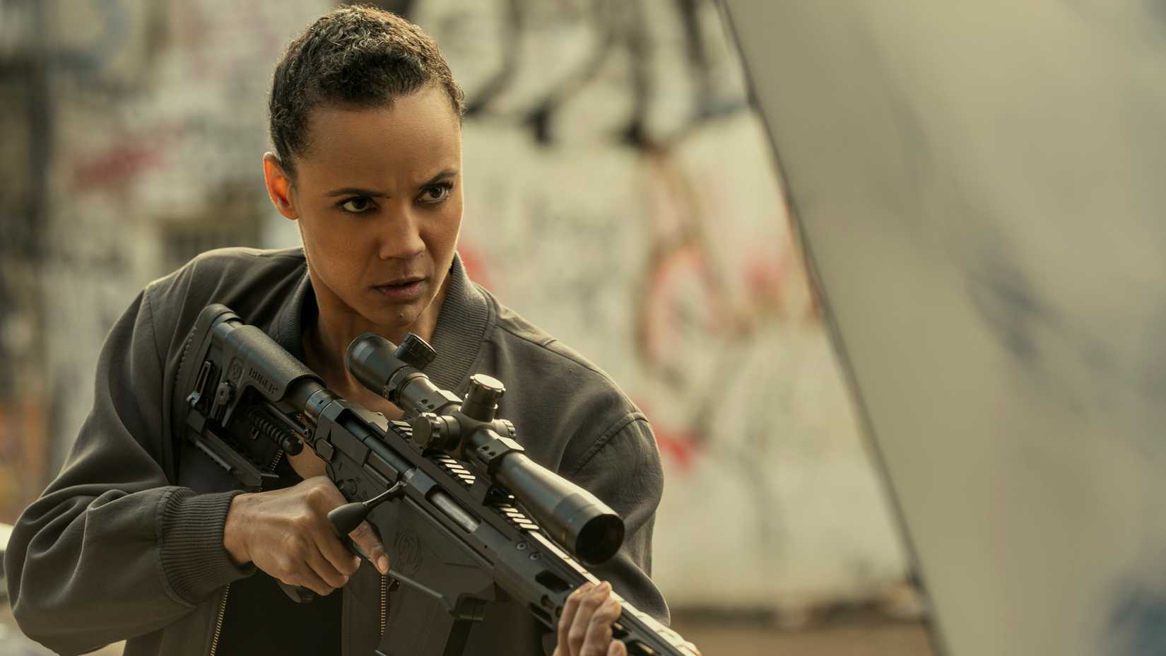 Maria Sten with a rifle in Neagley