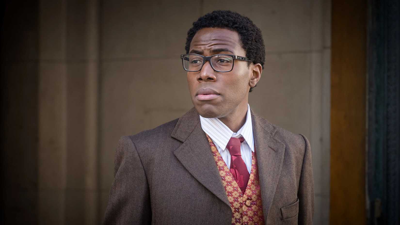 Nick (Daniel Lawrence Taylor) staring at something in Timewasters.