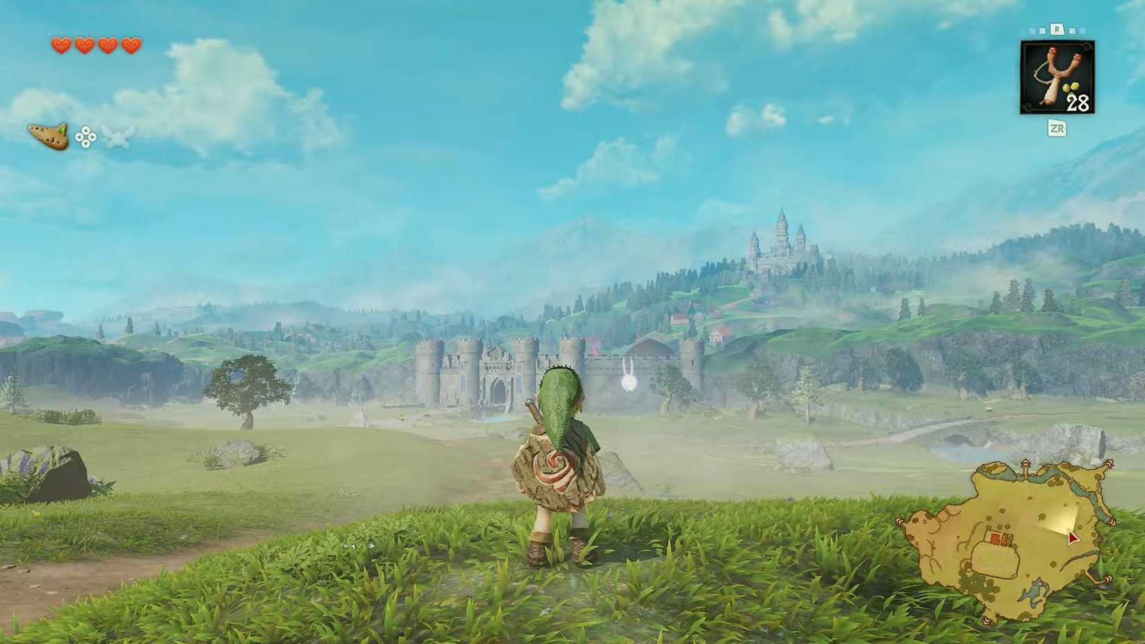 Link looking at Hyrule Castle in Hyrule Field in the Ocarina of Time remake.