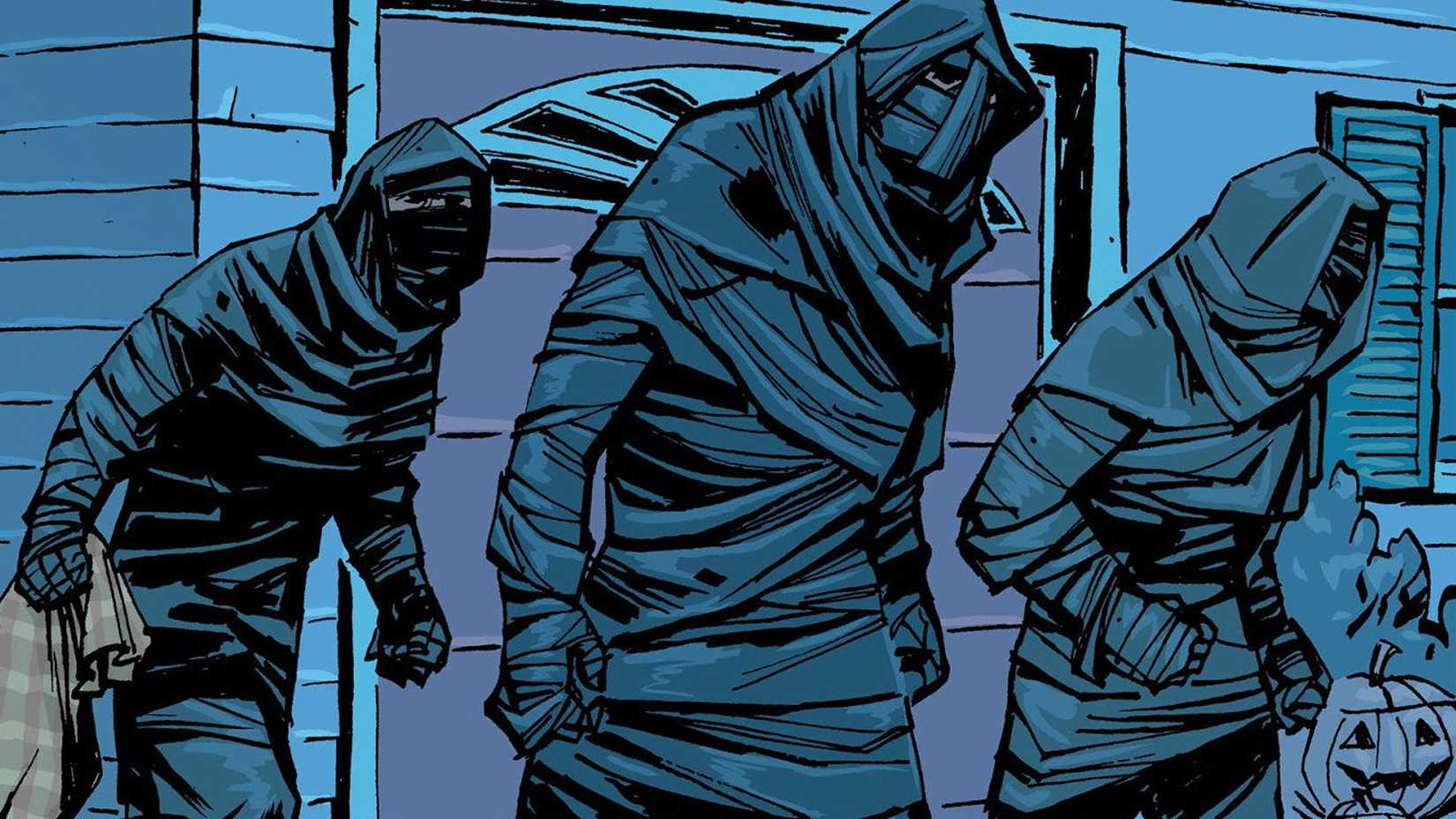 Paper Girls comic panel featuring three mysterious hooded figures approaching a suburban house