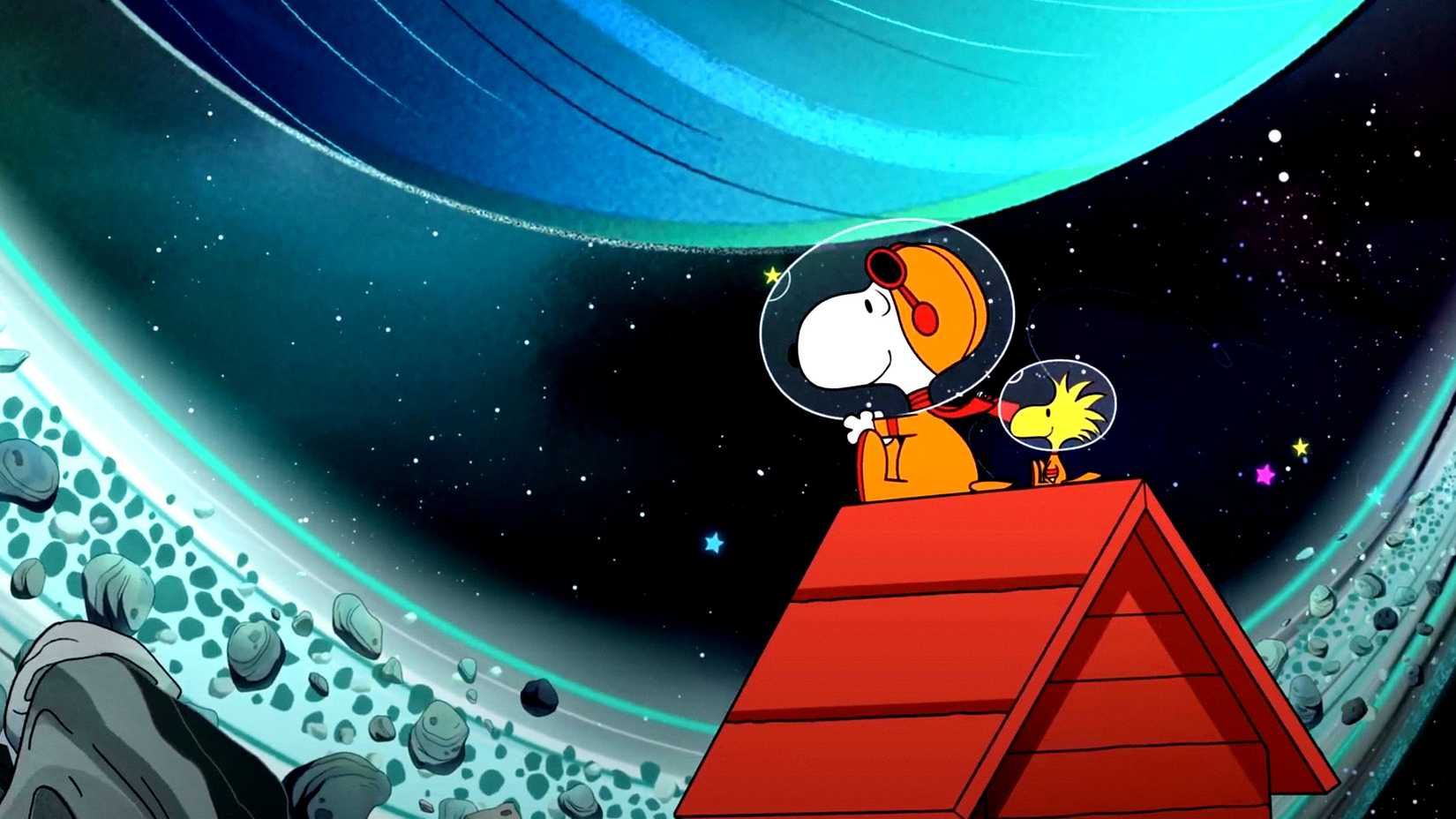 Peanuts' Snoopy and Woodstock sit on their red dog house in outer space