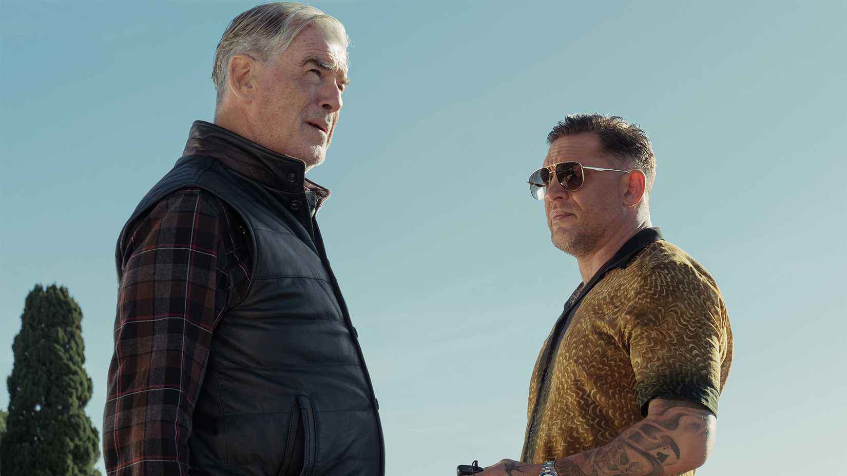 Pierce Brosnan as Conrad Harrigan and Tom Hardy as Harry Da Souza In MobLand, season 2