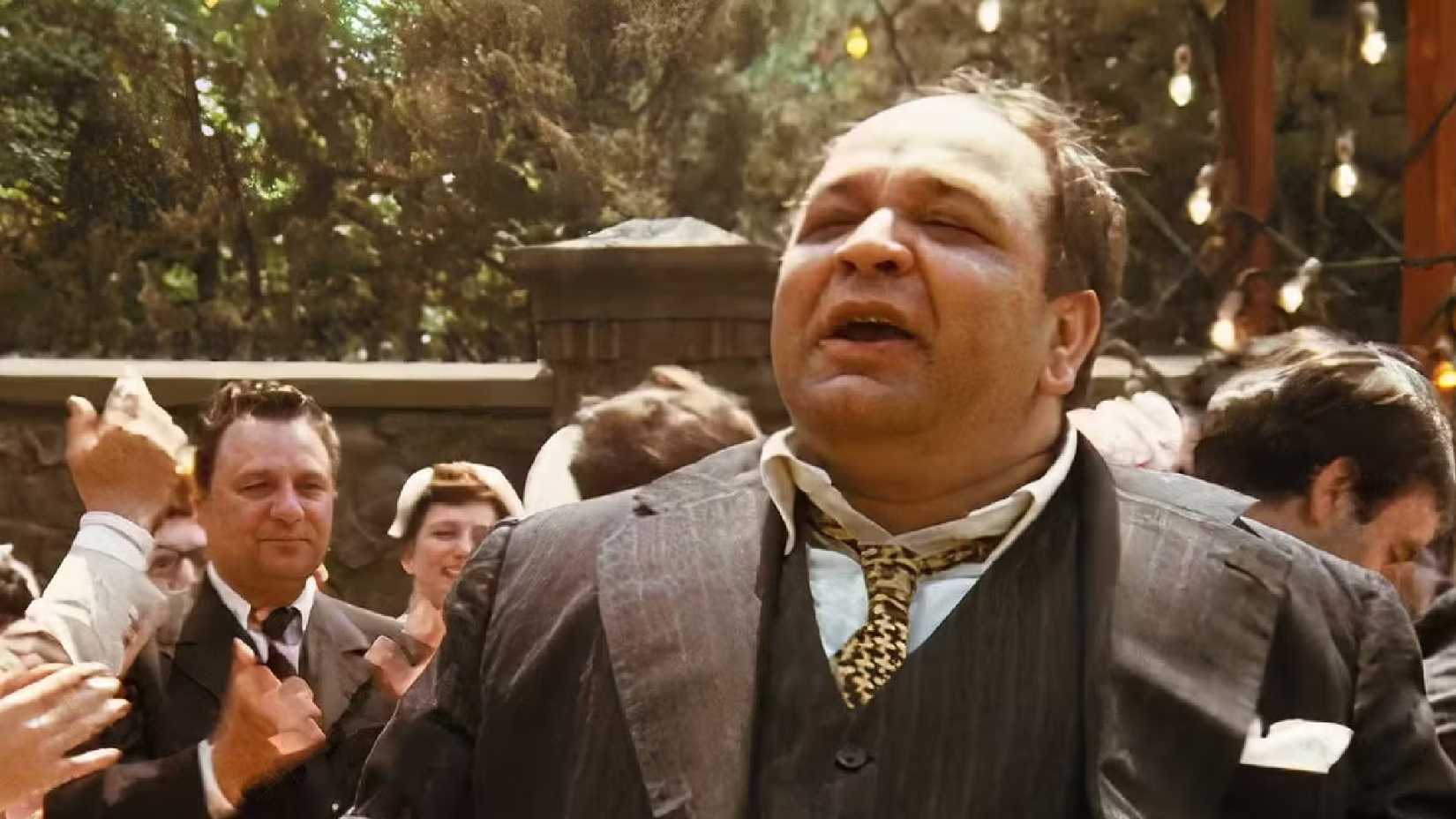 Richard s Castellano as Peter Clemenza stands up at Connies wedding in The Godfather