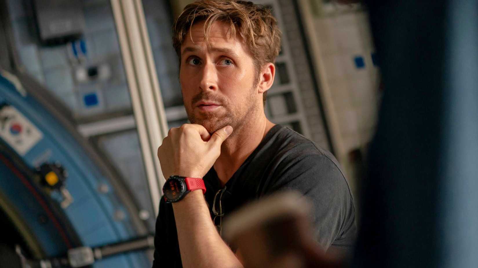 Ryan Gosling rubbing his chin in a promotional image from Project Hail Mary