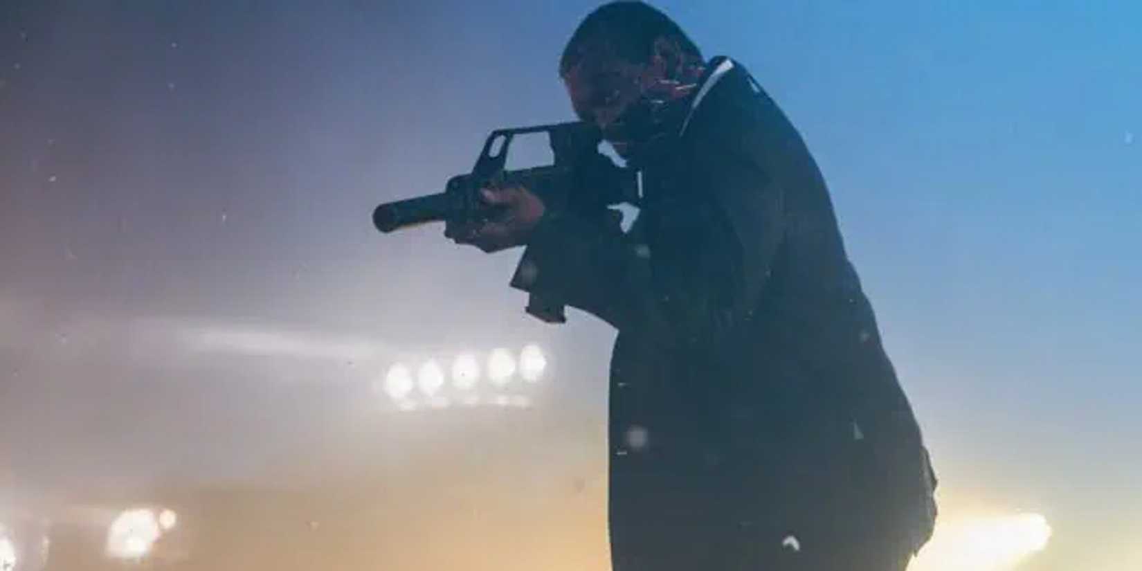 Samuel L Jackson with an assault rifle in The Beast