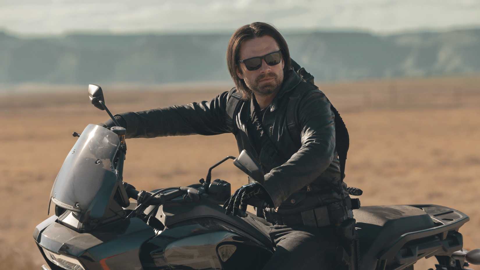 Sebastian Stan As Bucky Barnes Sitting On A Motorcycle In The Desert In Thunderbolts
