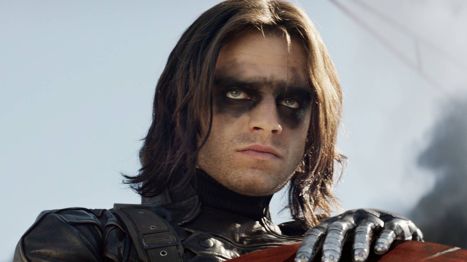 Sebastian Stan as Bucky Barnes Suited Up As Winter Soldier Holding Captain America's Shield In Captain America The Winter Soldier
