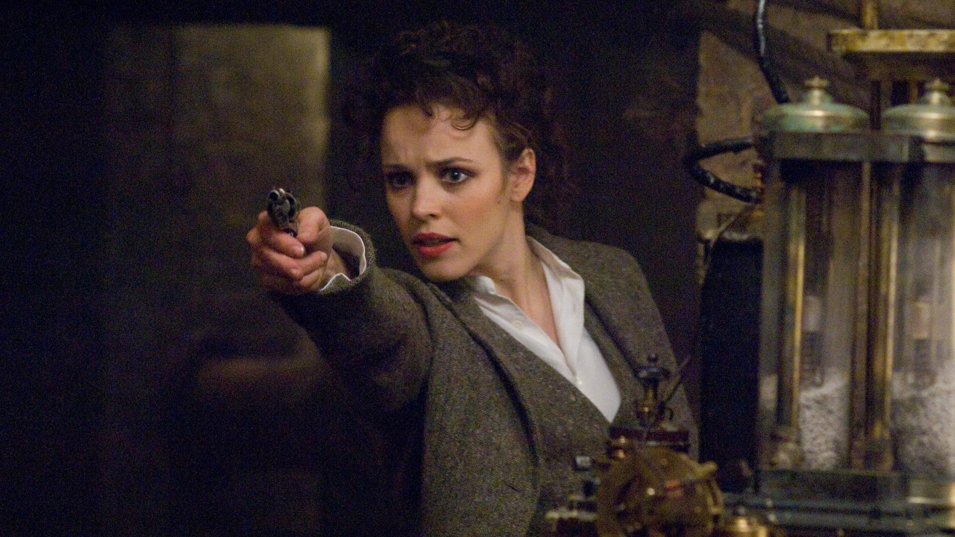 Irene Adler pointing a pistol