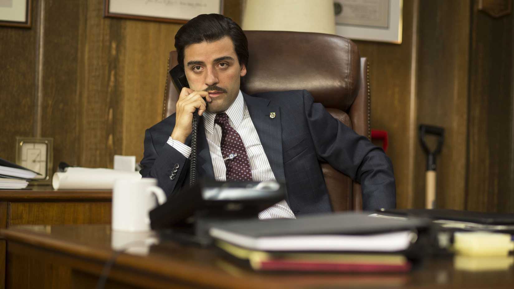 Nick Wasicsko (Oscar Isaac) on the phone behind a desk in Show Me a Hero.