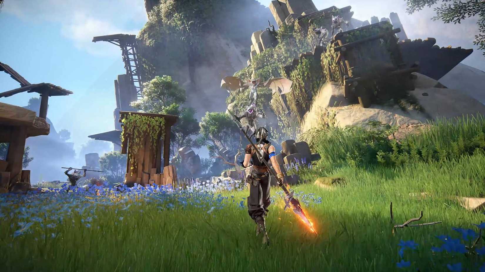 The player holding a spear near enemies in Sleepless Wild.