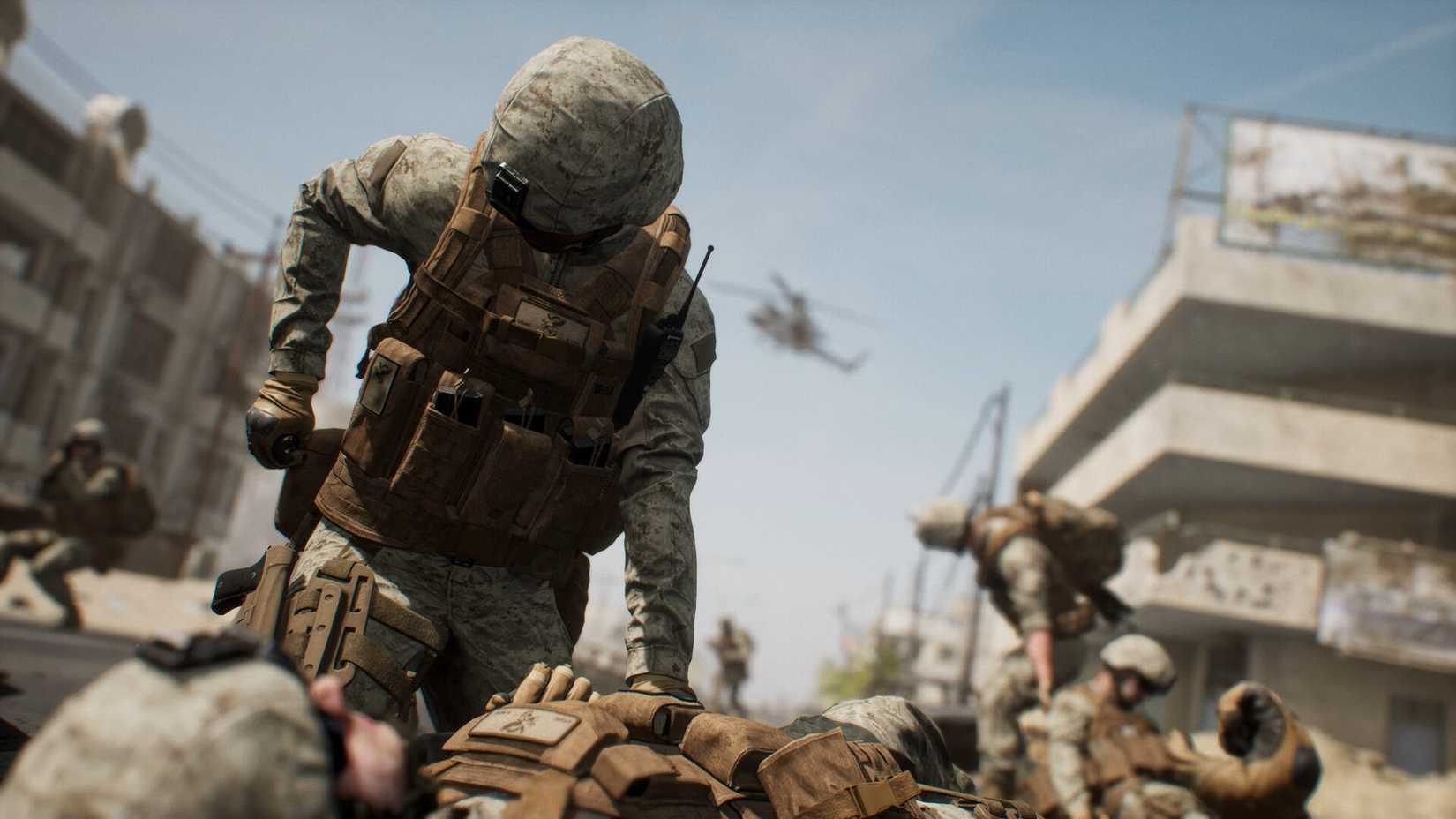 Players next to downed allies in Squad