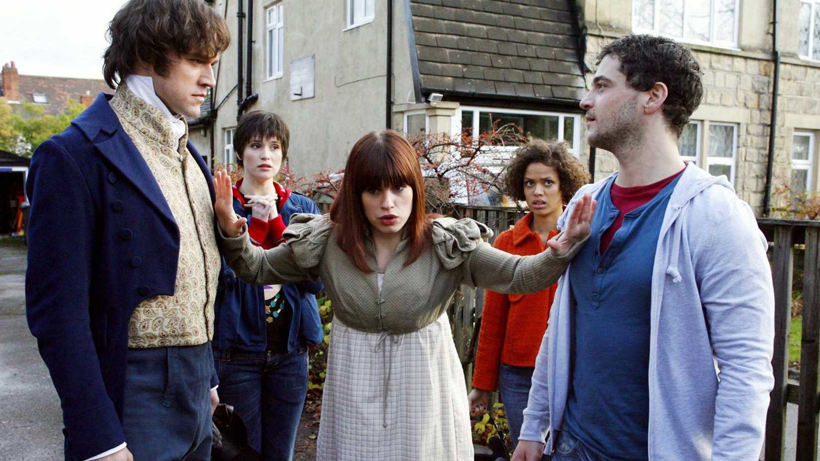 The cast of Lost in Austen arguing, two peope are wearing period costumes