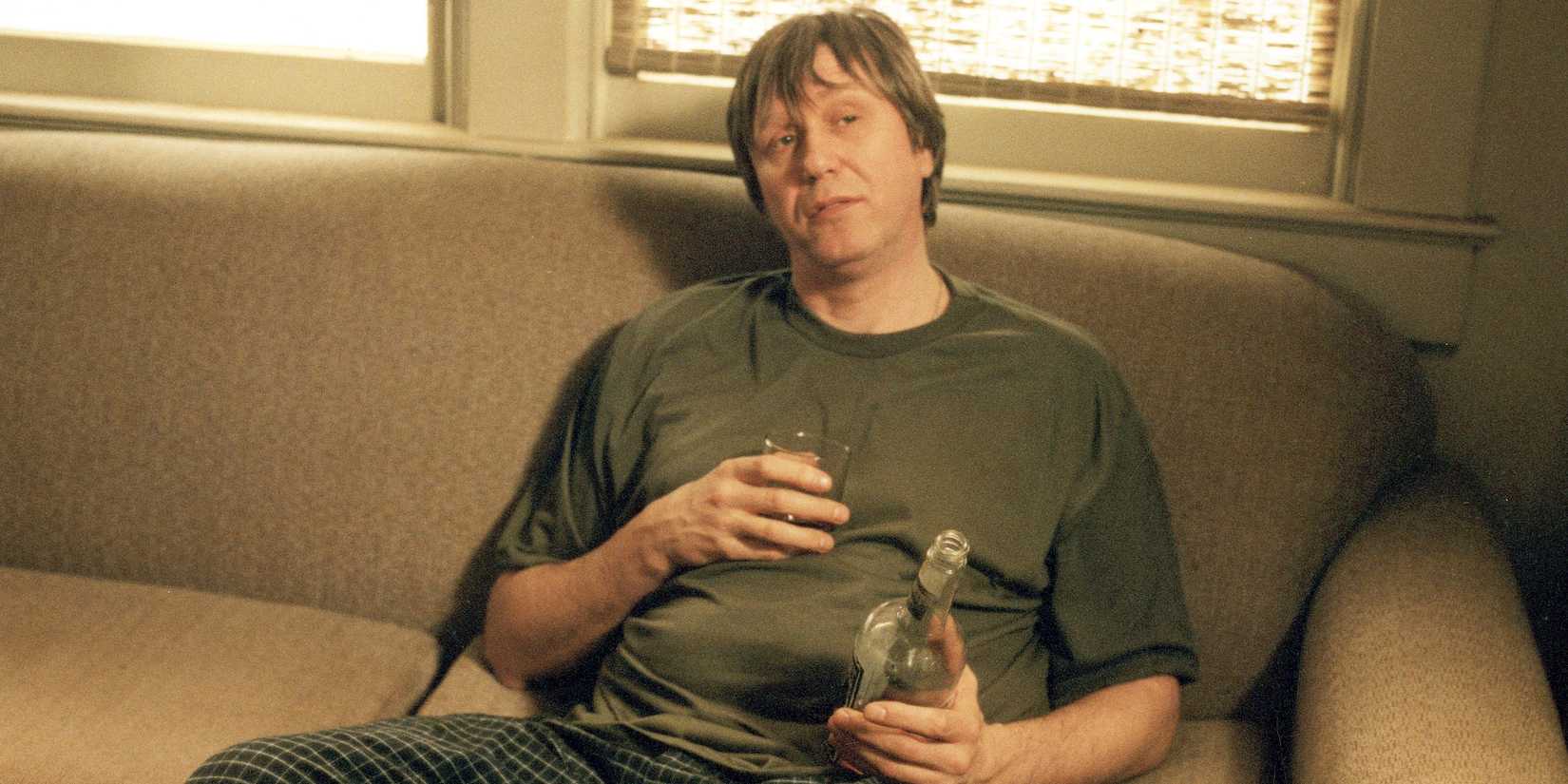 Valery drinking vodka on the couch in The Sopranos