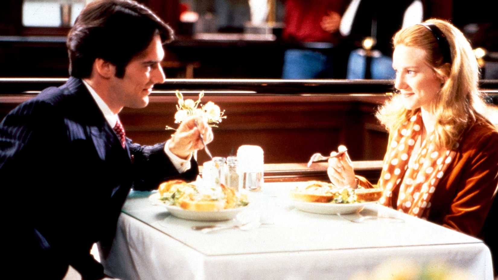 Beauchamp (Thomas Gibson) and Mary Ann (Laura Linney) having dinner in Tales of the City.