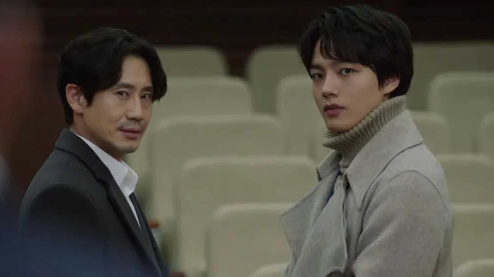 Two men looking at the camera in Beyond Evil