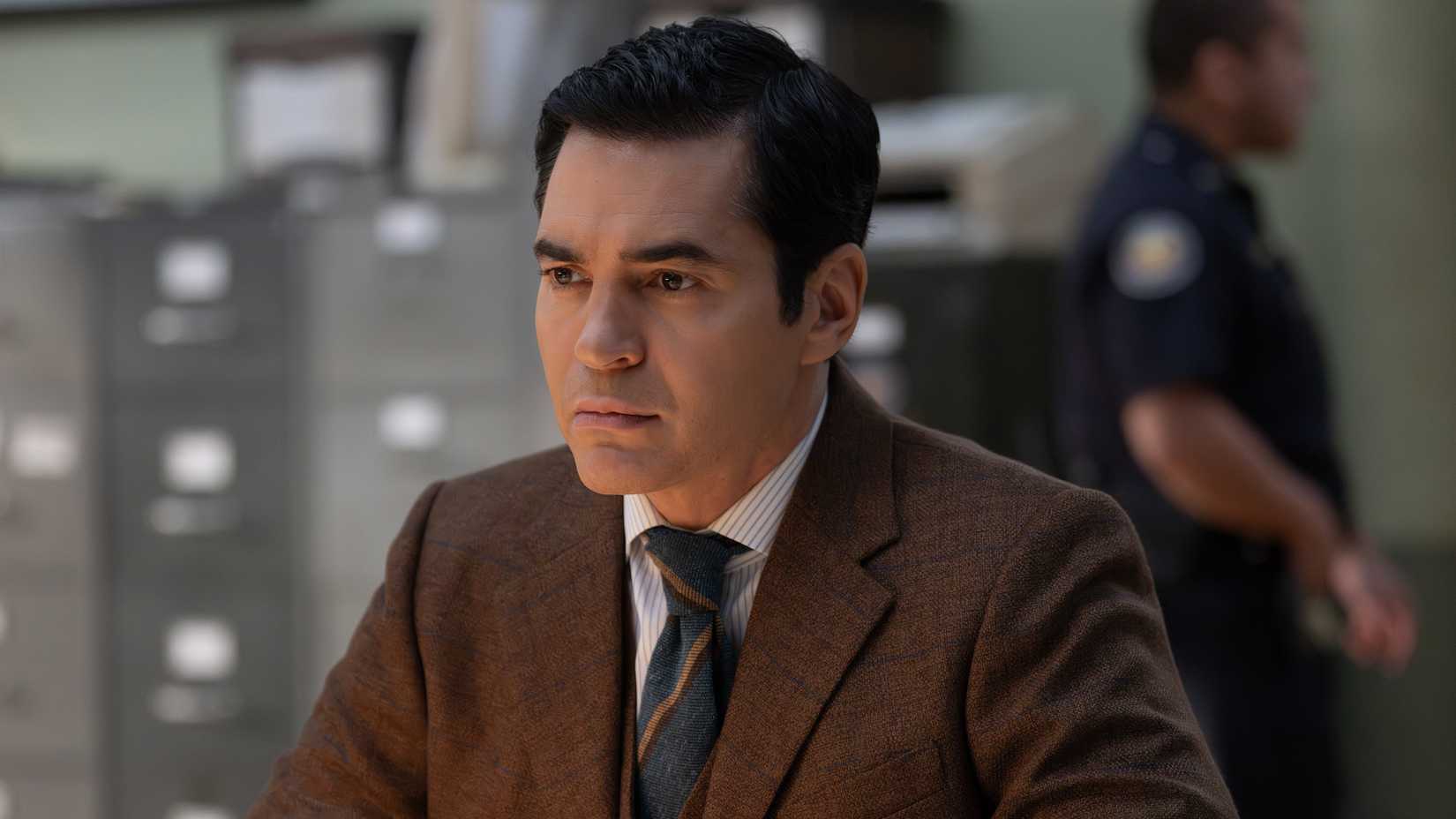 Will Trent sitting at a desk in a still from Will Trent season 4